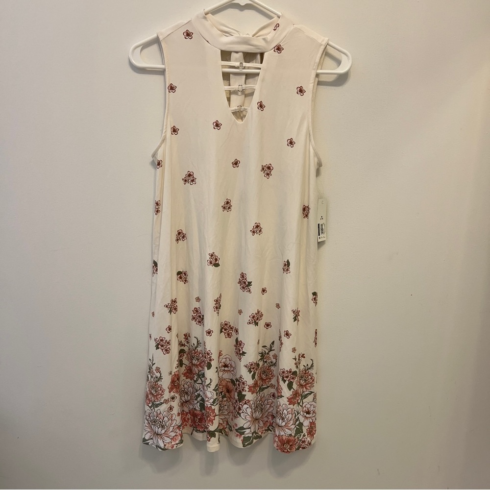 No Boundaries: Mock neck dress in off-white with beautiful flowers.